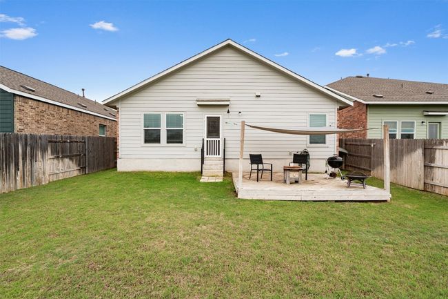 Back of home with deck and awning | Image 25