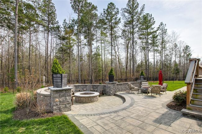 View of patio / terrace with an outdoor fire pit | Image 41