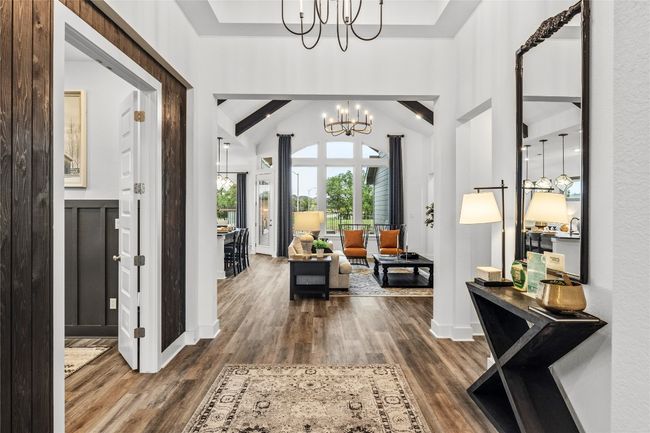 Foyer featuring a chandelier and wood finished floors | Image 4