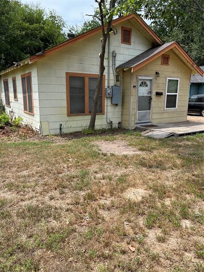 Rear view of house featuring a lawn | Image 3