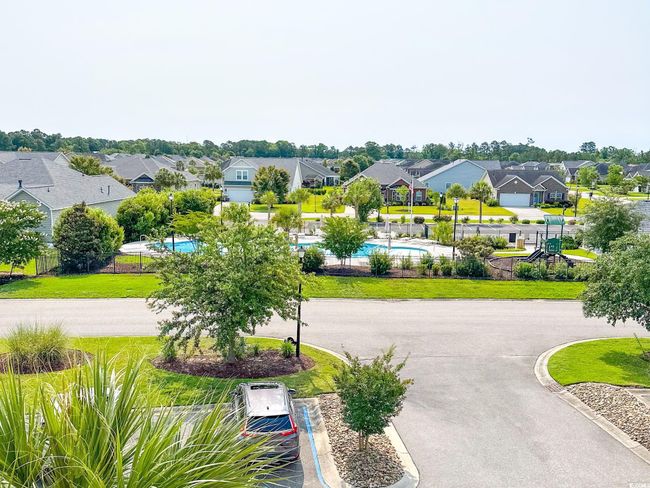 View of community with a residential view and a pool | Image 32