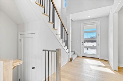 Entrance foyer featuring light wood-type flooring | Image 1