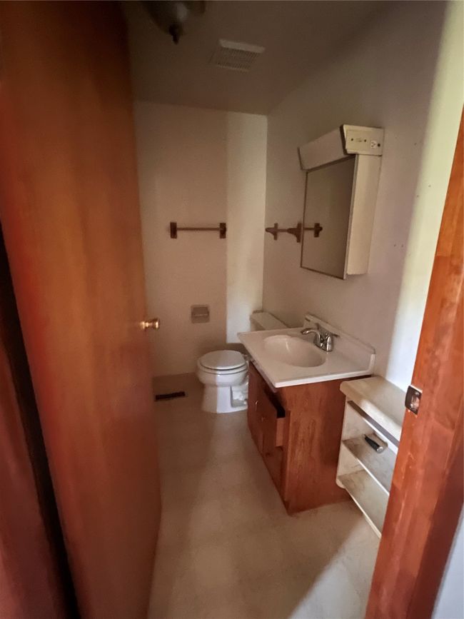 Main floor bedrrom/bathroom. | Image 8