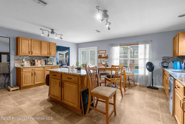 10457 Cranston St, House other with 5 bedrooms, 2 bathrooms and null parking in Spring Hill FL | Image 9
