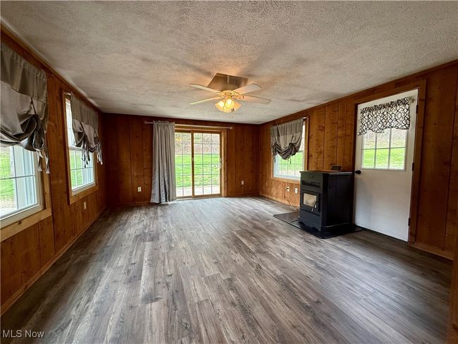 sun room with pellet stove | Image 18