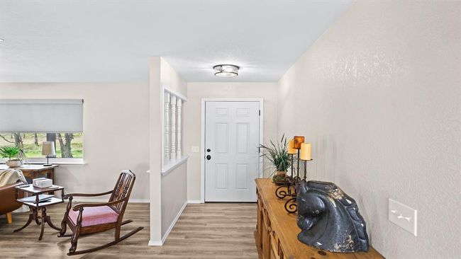 Entrance foyer with baseboards and light wood-style floors | Image 29
