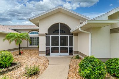 The front entry is screened and has tiled flooring. | Image 2