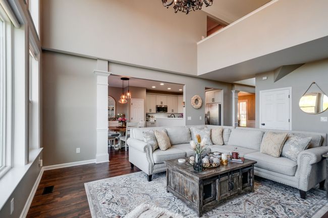 Another view of the living room showing the great flow to the breakfast room and the kitchen. | Image 12