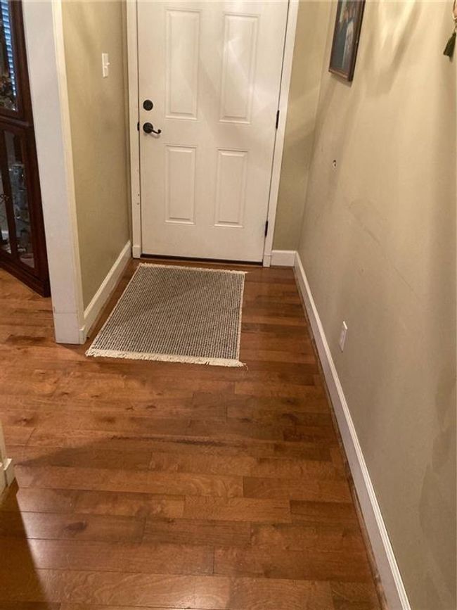 Entryway with dark hardwood / wood-style flooring | Image 20