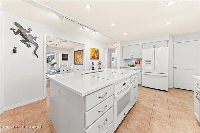 Kitchen opens onto Dining and Family Room | Image 23