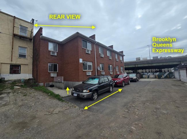View of property featuring uncovered parking | Image 22