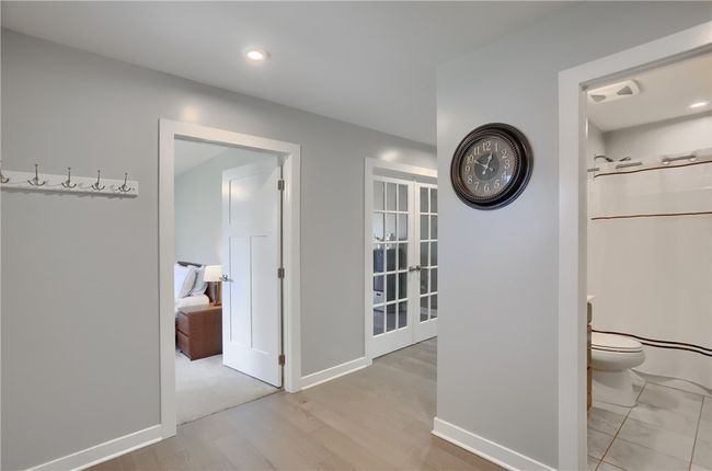 Hallway leading to office and main living area. | Image 19