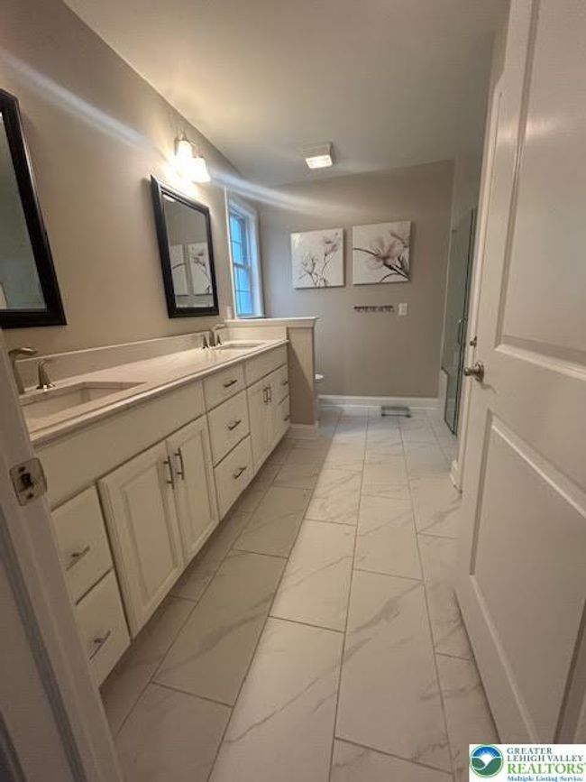 Primary BA with dual vanities and seamless shower with zero entry | Image 21