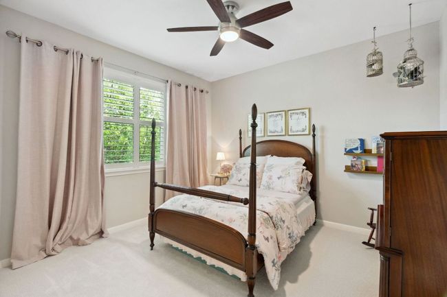 In the back corner of the main floor you will find this convenient main floor guest bedroom. | Image 18