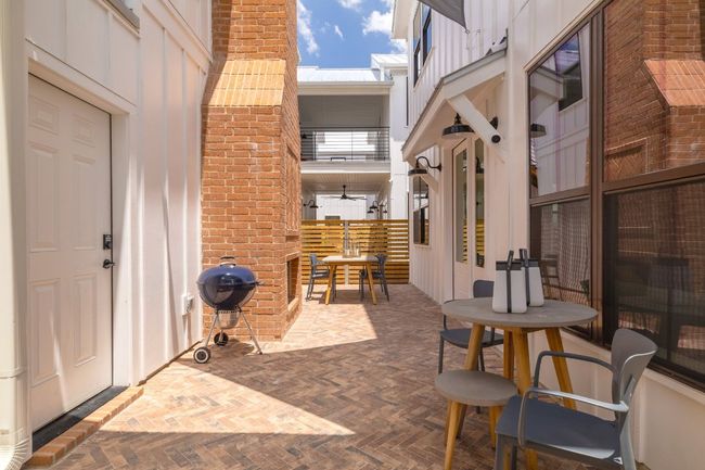 Back patio with outdoor fireplace | Image 21