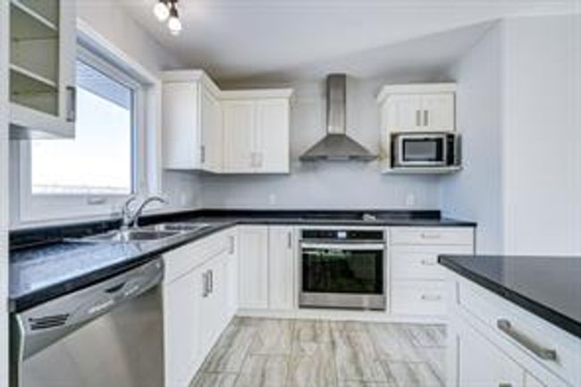 4004 74 Ave, House detached with 5 bedrooms, 2 bathrooms and 3 parking in Lloydminster AB | Image 11