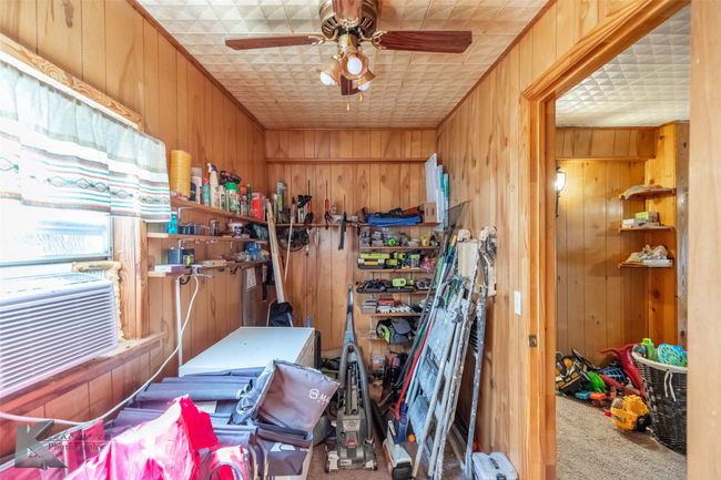 Storage area featuring cooling unit and ceiling fan | Image 27