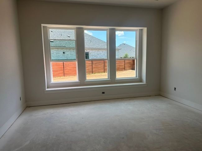 Spare room with concrete flooring and baseboards | Image 5