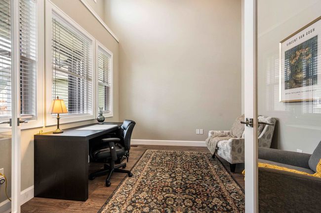 Office area with baseboards and wood finished floors | Image 10