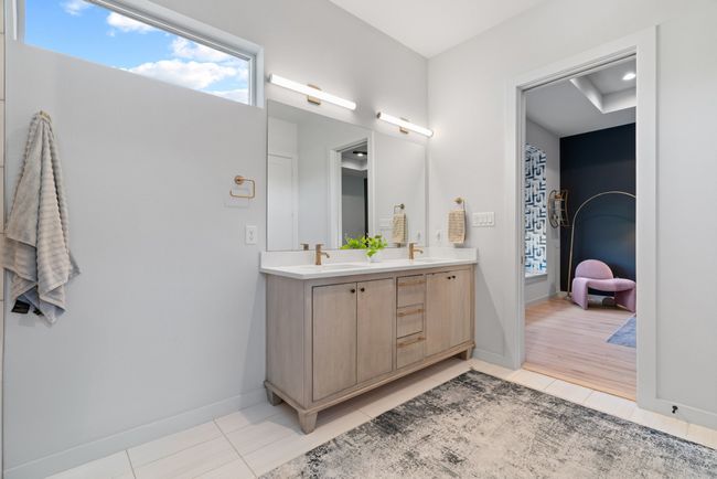Full bathroom featuring double vanity and tile patterned flooring | Image 27