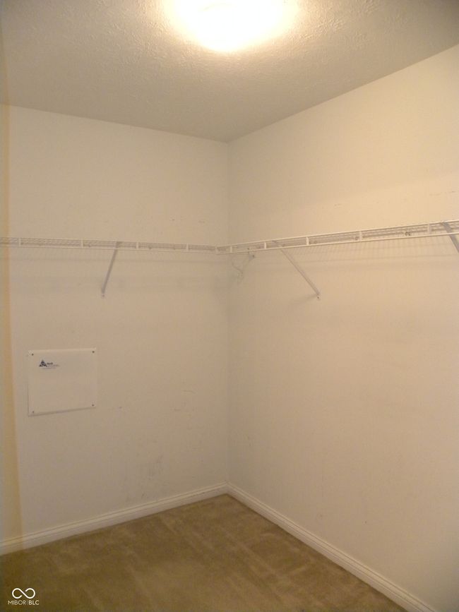Large walk-in closet in primary bedroom | Image 15