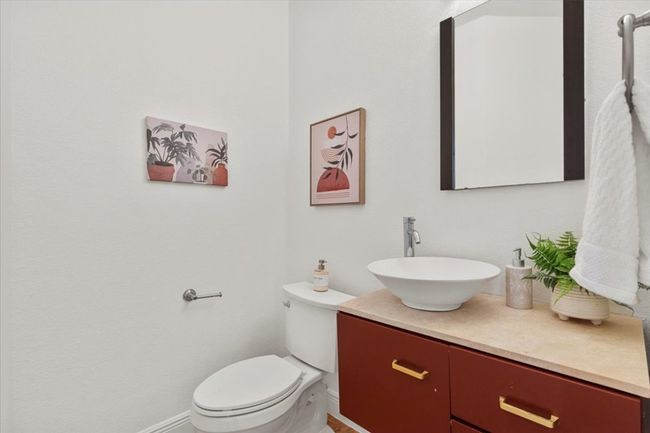 Powder room located downstairs | Image 28
