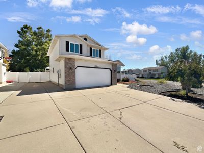 View of front of property featuring a garage | Image 1