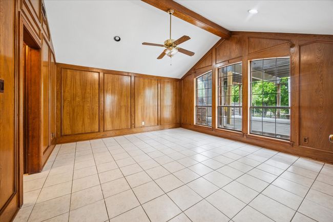 This second living area offers a host of possibilites including a home office or a den or place for a pool or ping pong table. | Image 23