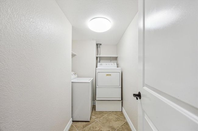 Laundry room accommodates King size washer and dryer | Image 17