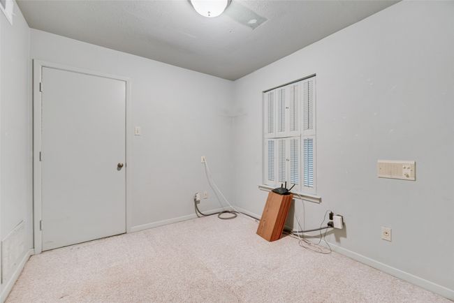 Carpeted spare room featuring baseboards | Image 30