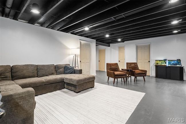 Living room with finished concrete floors | Image 28