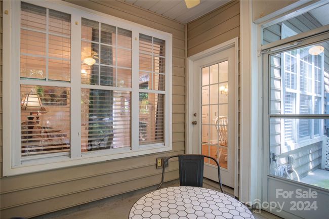 Enjoy coffee in the morning or relaxing in the evening in the privacy of your screened patio | Image 25