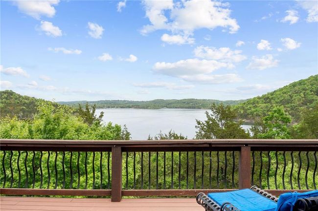 Wooden terrace with a wooded view and a water view | Image 5
