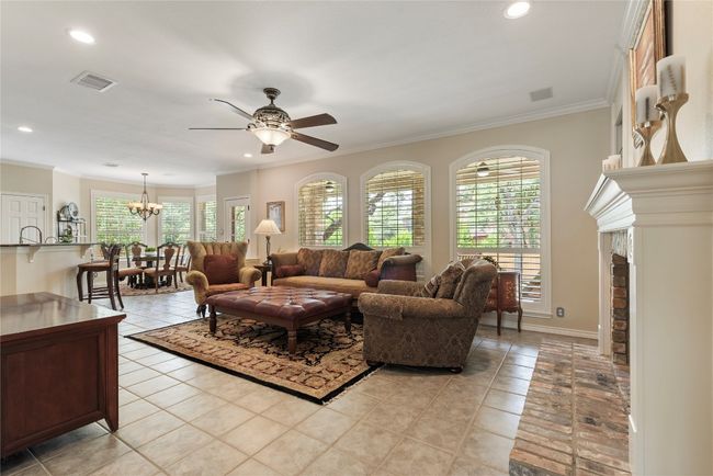 Spacious open-concept layout with abundant natural light and seamless flow from living to dining. | Image 11