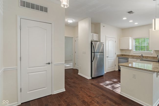 Utility closet with water heater, new heat pump and new air handler | Image 22