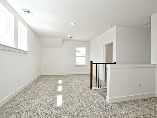 Empty room featuring carpet, recessed lighting, and a smoke detector | Image 15
