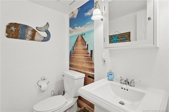 Upper level half bath | Image 9