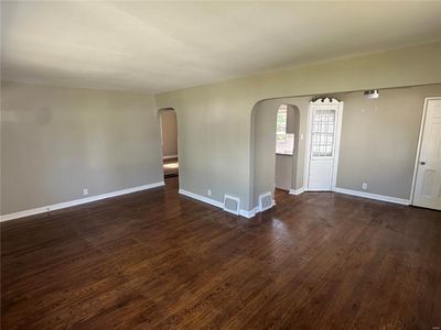 Empty room featuring dark hardwood / wood-style floors | Image 3