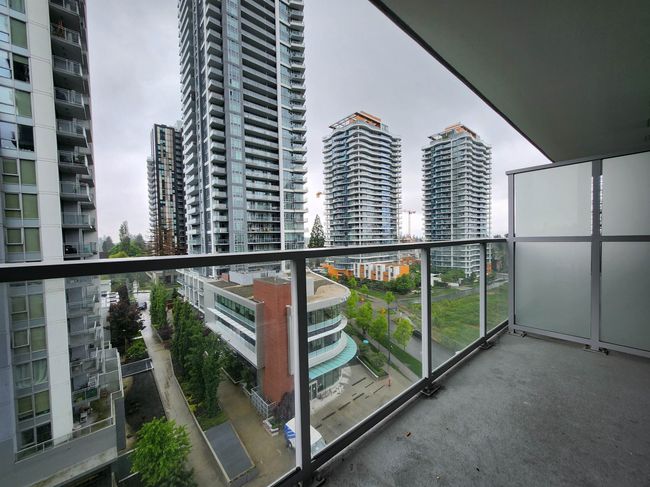 Balcony with a view of city | Image 9