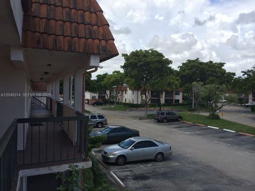 104-14-861 Ne 207th Ln, Miami, FL, 33179-1948 | Card Image