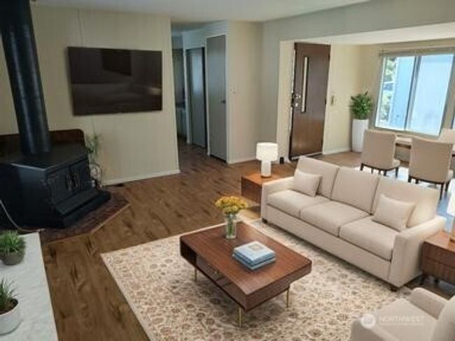 The living room is quite large and bright | Image 18