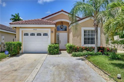 7703 Springfield Lake Dr, Lake Worth, FL, 33467-7892 | Card Image