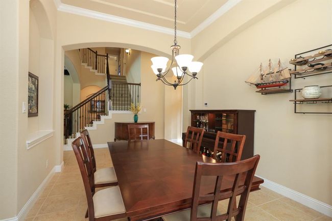 Expansive space- easy to pull the table even further our for large gatherings. | Image 12