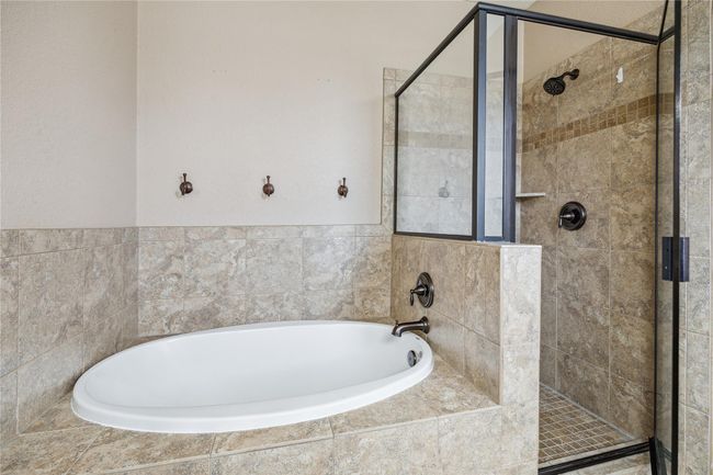 Separate tub and shower in primary bathroom | Image 16