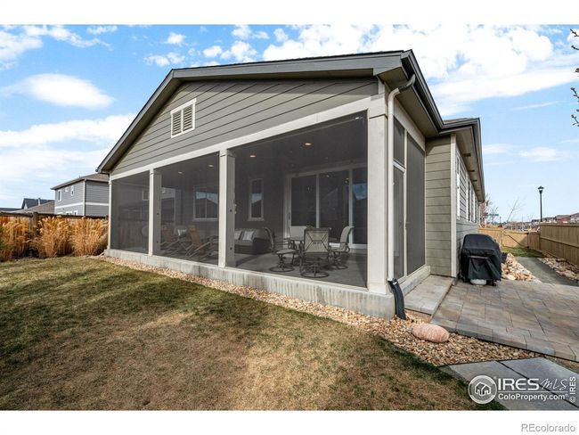 Screened-in back patio is perfect to enjoy all of Colorados seasons | Image 27