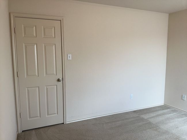 Bedroom with carpet floors | Image 20