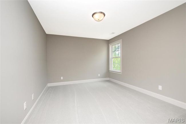 Upstairs bedroom with light colored carpet and baseboards | Image 30