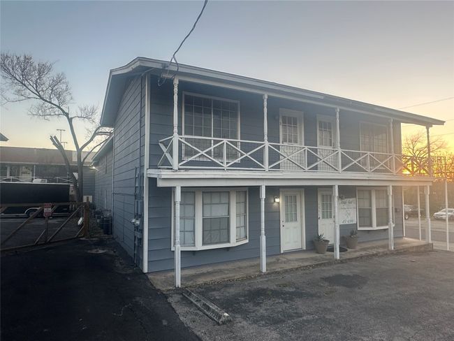 View of front of home featuring a balcony and covered porch | Image 4