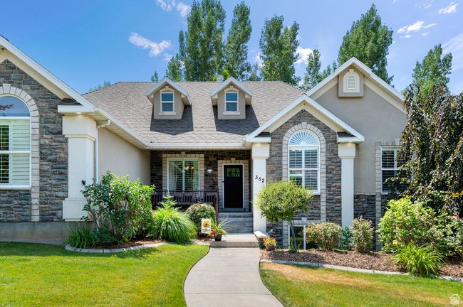 Craftsman house with stone siding and a shingled roof | Image 41