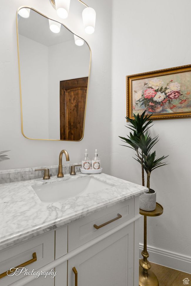 Bathroom with vanity and baseboards | Image 45